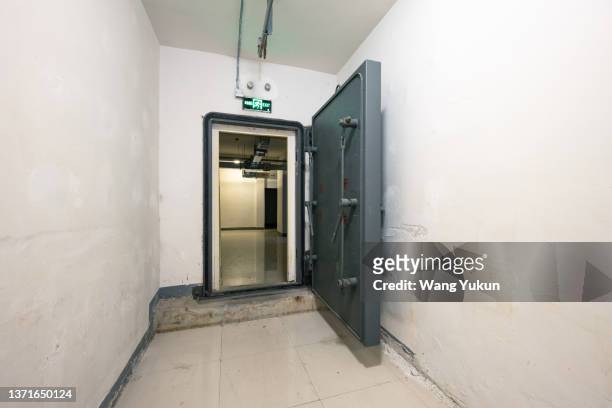 strong iron door of underground warehouse - shelter bildbanksfoton och bilder