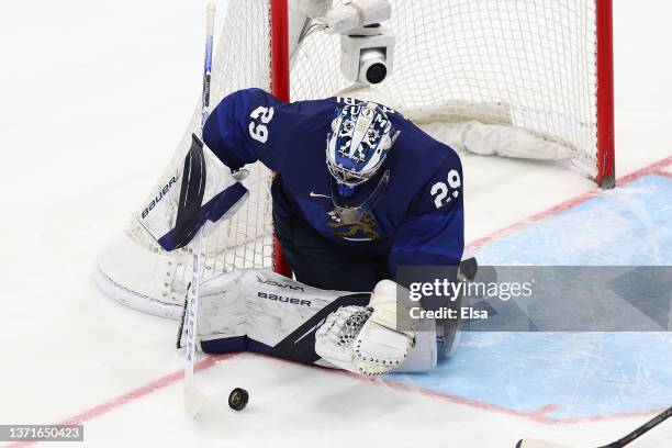 Harri Sateri of Team Finland block a shot in the first period during the Men's Ice Hockey Gold Medal match between Team Finland and Team ROC on Day...