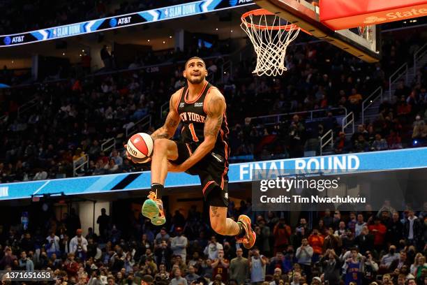 Obi Toppin of the New York Knicks dunks the ball during the AT&T Slam Dunk Contest as part of the 2022 NBA All Star Weekend at Rocket Mortgage...