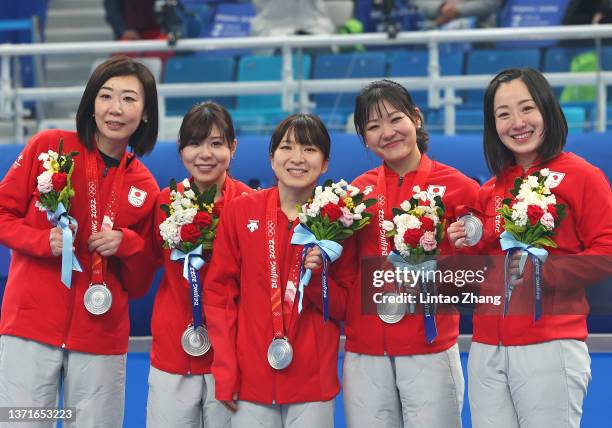 Silver medalists Kotomi Ishizaki, Yurika Yoshida, Yumi Suzuki, Chinami Yoshida and Satsuki Fujisawa of Team Japan pose for a photo during the medal...