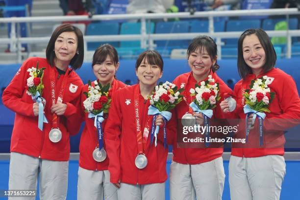 Silver medalists Kotomi Ishizaki, Yurika Yoshida, Yumi Suzuki, Chinami Yoshida and Satsuki Fujisawa of Team Japan pose for a photo during the medal...