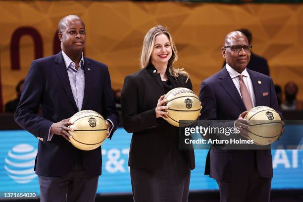 Wayne A. I. Frederick President of Howard University stands with Molly Kocour Boyle, president of AT&T Ohio, and David Wilson President of Morgan...