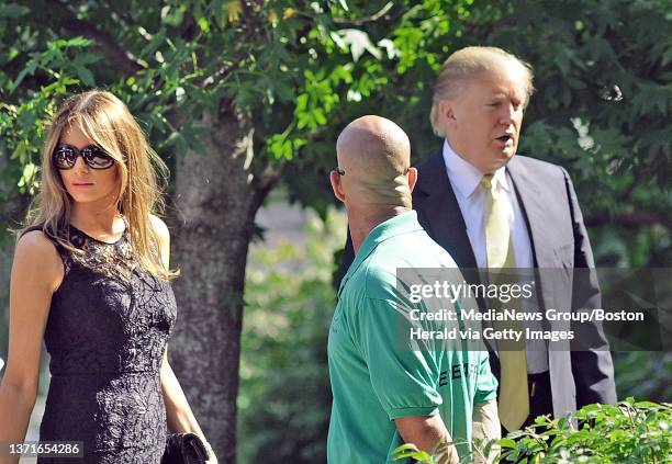 Funeral services for Myra H. Kraft at Temple Emanuel Friday morning July 22, 2011. Donald Trump arrives at the Temple. Don't have an ID on the women...