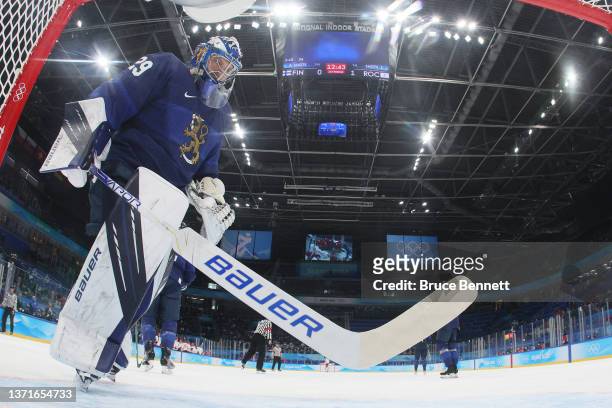 Harri Sateri of Team Finland in front of the net during stoppage of play in the first period during the Men's Ice Hockey Gold Medal match between...