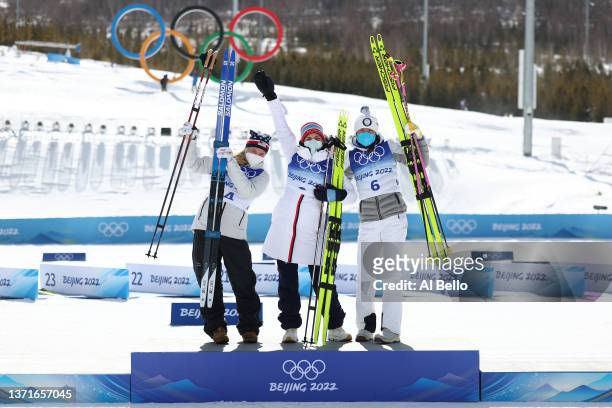 Gold medallist Therese Johaug of Team Norway , Silver medallist Jessie Diggins of Team United States and Bronze medallist Kerttu Niskanen of Team...