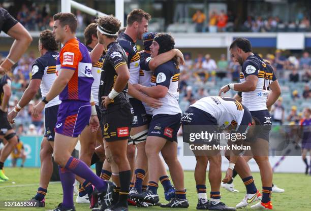 Lachlan Lonergan of the Brumbies is congratulated after scoring the winning try during the round one Super Rugby Pacific match between the ACT...