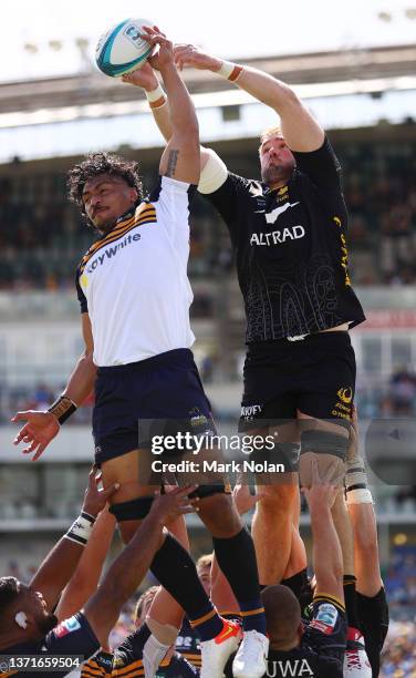 Pete Samu of the Brumbies and Izack Rodda of the Force contest a line out during the round one Super Rugby Pacific match between the ACT Brumbies and...