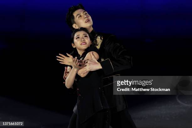 Shiyue Wang and Xinyu Liu of Team China skate during the Figure Skating Gala Exhibition on day sixteen of the Beijing 2022 Winter Olympic Games at...