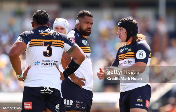 Lachlan Lonergan of the Brumbies chats with fron row team mate Scott Sio during the round one Super Rugby Pacific match between the ACT Brumbies and...
