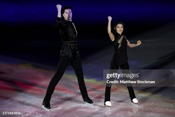 Shiyue Wang and Xinyu Liu of Team China react during the Figure Skating Gala Exhibition on day sixteen of the Beijing 2022 Winter Olympic Games at...