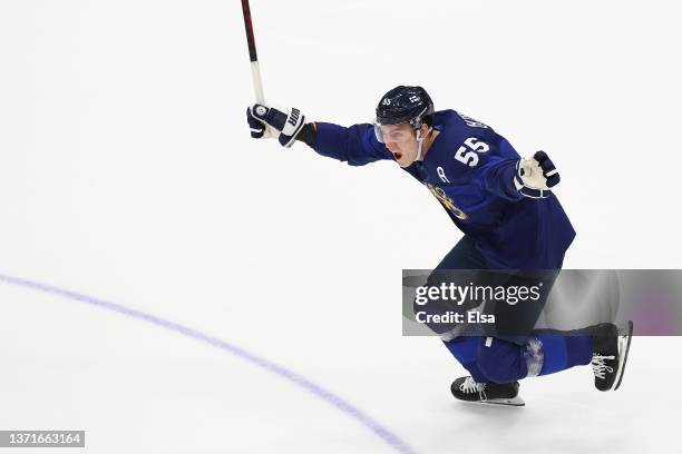 Atte Ohtamaa of Team Finland celebrates a goal scored by Hannes Bjorninen in the third period during the Men's Ice Hockey Gold Medal match between...