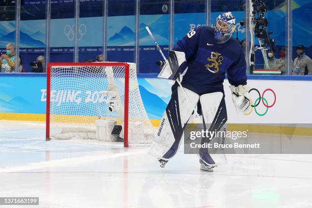 Harri Sateri of Team Finland looks on prior to the start of the third period during the Men's Ice Hockey Gold Medal match between Team Finland and...
