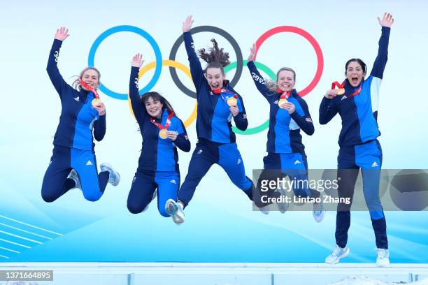 Curlers Milli Smith, Hailey Duff, Jennifer Dodds, Vicky Wright and Eve Muirhead of Team Great Britain pose for pictures after winning the Gold Medal...