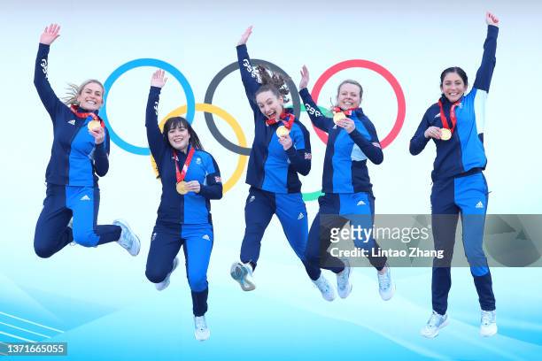 Curlers Milli Smith, Hailey Duff, Jennifer Dodds, Vicky Wright and Eve Muirhead of Team Great Britain pose for pictures with their gold medals after...