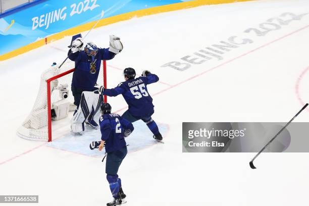 Harri Sateri of Team Finland celebrates with teammates after winning the Men's Ice Hockey Gold Medal match against Team ROC 2-1 on Day 16 of the...
