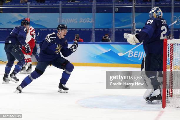 Harri Sateri of Team Finland celebrates with teammates after winning the Gold medal during the Men's Ice Hockey Gold Medal match between Team Finland...