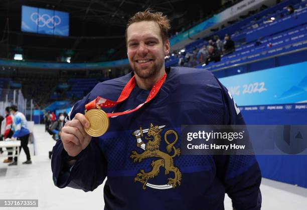 Harri Sateri of Team Finland poses with his gold medal following the Men's Ice Hockey medal ceremon on Day 16 of the Beijing 2022 Winter Olympic...