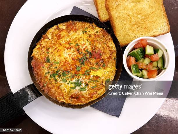 tunisia style breakfast set - frittata stock-fotos und bilder