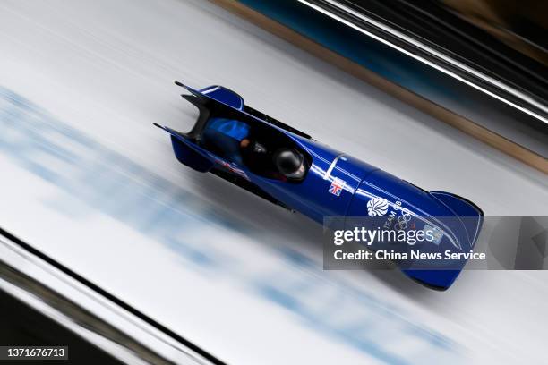 Mica Mcneill and Montell Douglas of Team Great Britain compete during the 2-women Bobsleigh Heat 3 on Day 15 of the Beijing 2022 Winter Olympic Games...