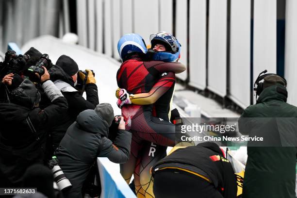 Laura Nolte and Deborah Levi of Team Germany celebrate winning the 2-women Bobsleigh on Day 15 of the Beijing 2022 Winter Olympic Games at Yangqing...