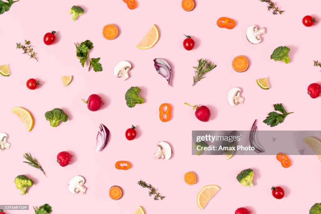 Pattern of healthy organic food with vegetables on summer pink background