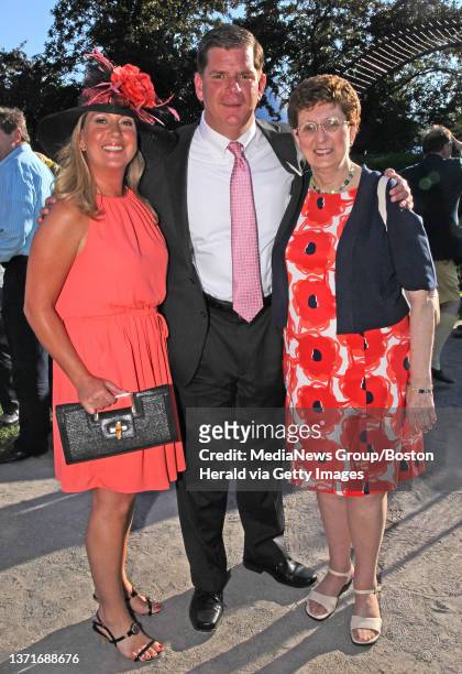 Mayor Marty Walsh with his girlfriend Lorrie Higgins and mother Mary Walsh during the Rose Garden Party on Thursday, June 19, 2014.