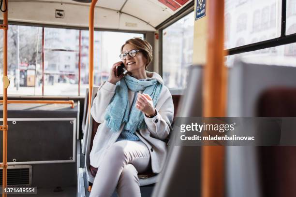 beautiful senior woman outdoors in the city - public transport stock pictures, royalty-free photos & images