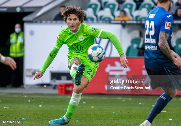 Jonas Wind of VfL Wolfsburg takes a shot during the Bundesliga match between VfL Wolfsburg and TSG Hoffenheim at Volkswagen Arena on February 19,...