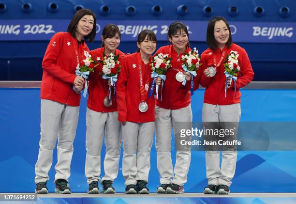 Silver medallists Kotomi Ishizaki, Yurika Yoshida, Yumi Suzuki, Chinami Yoshida and Satsuki Fujisawa of Team Japan celebrate during the medal...