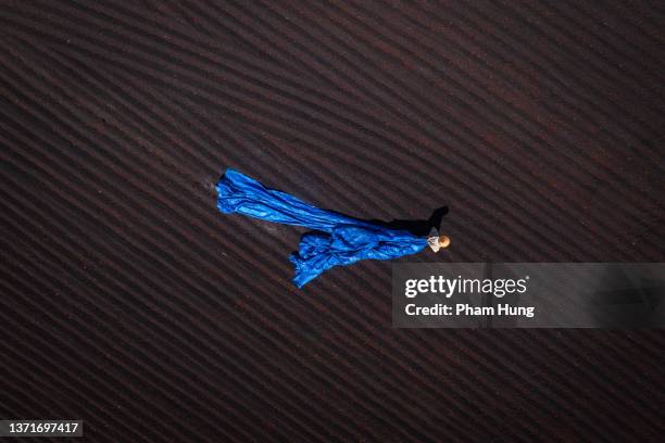 drying coffee bean in pleiku - farmer drone stock pictures, royalty-free photos & images