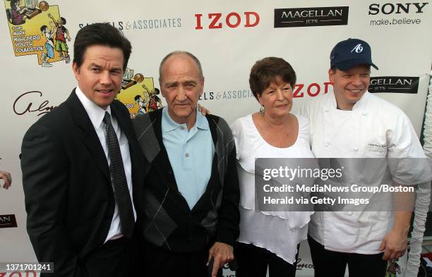 Mark Wahlberg arrives at the Alma Nove with his uncle Arthur Donnolly, mother Alma Wahlberg, and brother, Chef Paul Wahlberg for the premier party...