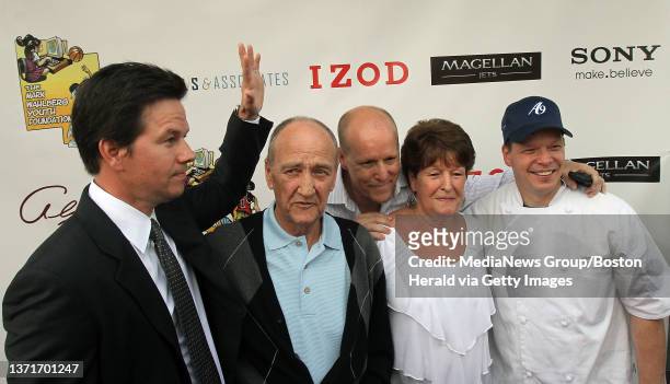 Mark Wahlberg arrives at the Alma Nove with his uncle Arthur Donnolly, brother Jim Wahlberg, mother Alma Wahlberg, and brother Chef Paul Wahlberg for...