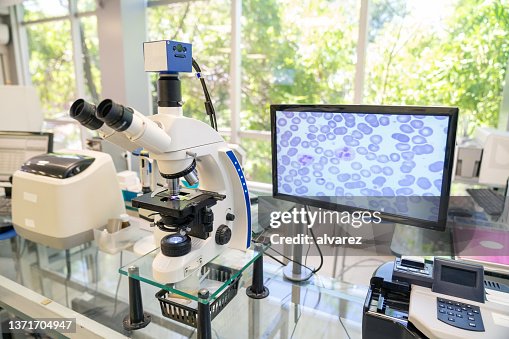 Modern microscope with digital imaging system in the lab Modern microscope with digital imaging system in the lab