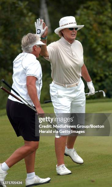Patty Sheehan congratulates partner Pat Bradley for a nice shot on the 8th during BJ's 2006 Charity Championship Legends Tour at Granite Links Golf...