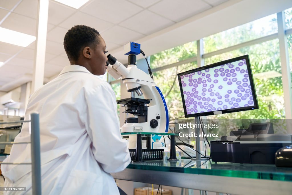 Scientist working in pathology lab