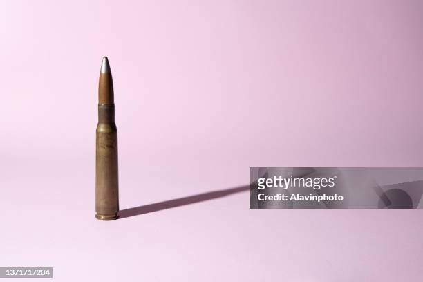 military equipment ammunition and camouflage uniform - bullets stock pictures, royalty-free photos & images