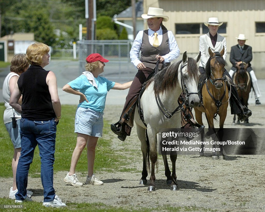 (08/09/08 Boston, Ma) The Herald goes to the paso Fino Fandango Horse Show at The Topsfield Fairgrounds. Contestants ride past spectators as they enter the arena. Staff Photo by Patrick Whittemore. Saved in Sunday and archive