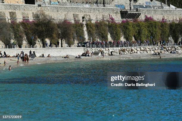 General view of the Peloton passing through Villefranche sur Mer start village while fans cheer during the 54th Tour Des Alpes Maritimes Et Du Var -...