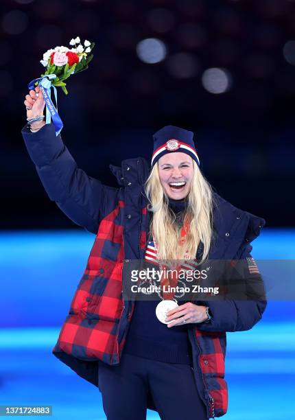Cross-Country Skiing Women's 30Km Mass Start Free Silver medallist Jessie Diggins of Team United States celebrates with her medal during the Beijing...