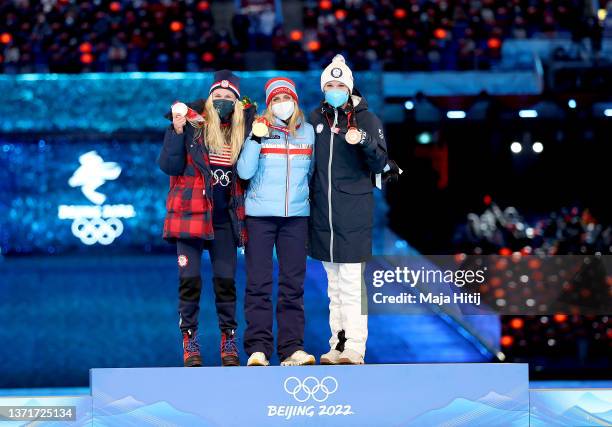 Gold medallist Therese Johaug of Team Norway , Silver medallist Jessie Diggins of Team United States and Bronze medallist Kerttu Niskanen of Team...