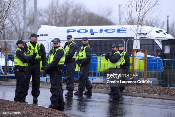 Police officers are seen outside the stadium prior to the Premier League match between Leeds United and Manchester United at Elland Road on February...
