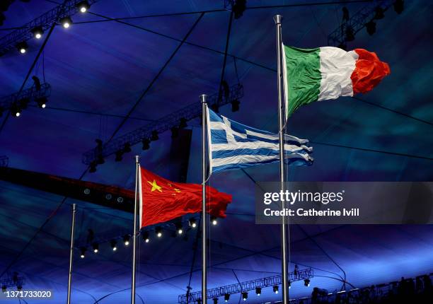 The national flags of China , Greece and Italy are seen during the Beijing 2022 Winter Olympics Closing Ceremony on Day 16 of the Beijing 2022 Winter...