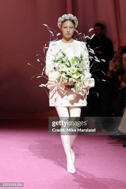 Lila Moss walks the runway at the Richard Quinn show during London Fashion Week February 2022 on February 19, 2022 in London, England.
