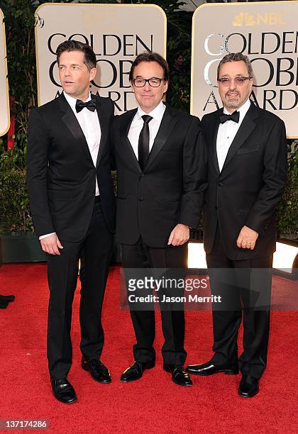 Producers Brunson Green, Chris Columbus, and Michael Barnathan arrive at the 69th Annual Golden Globe Awards held at the Beverly Hilton Hotel on...