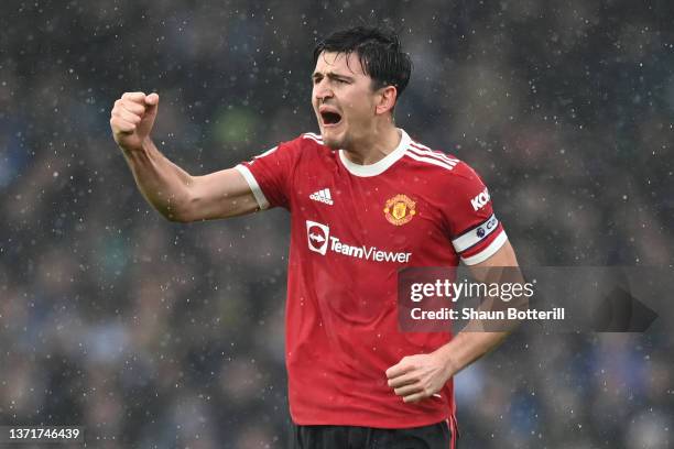 Harry Maguire of Manchester United celebrates after scoring their team's first goal during the Premier League match between Leeds United and...