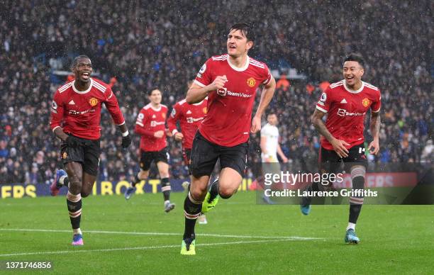Harry Maguire of Manchester United celebrates after scoring their team's first goal during the Premier League match between Leeds United and...