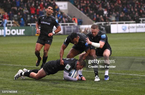 Falcons player Will Haydon-Wood is congratulated by team mates after scoring the opening try during the Gallagher Premiership Rugby match between...