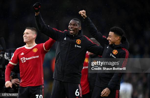 Paul Pogba and Jesse Lingard of Manchester United celebrate after victory in the Premier League match between Leeds United and Manchester United at...