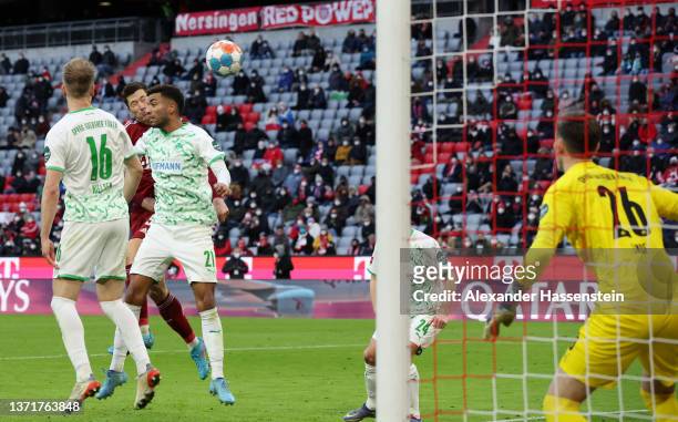 Robert Lewandowski of FC Bayern Muenchen scores their team's third goal during the Bundesliga match between FC Bayern München and SpVgg Greuther...