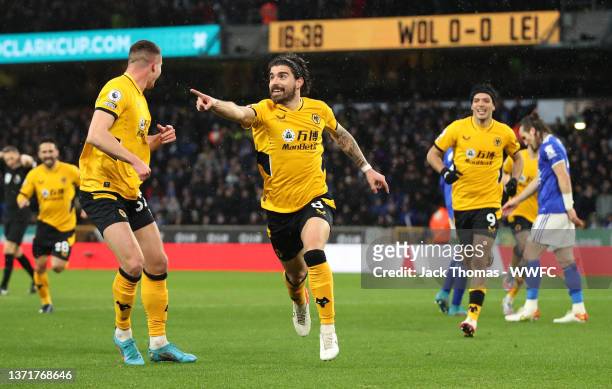 Ruben Neves of Wolverhampton Wanderers celebrates after scoring their team's first goal during the Premier League match between Wolverhampton...